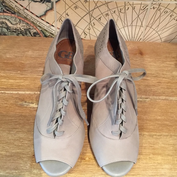 Open toe, lace up, wedges. Worn once.