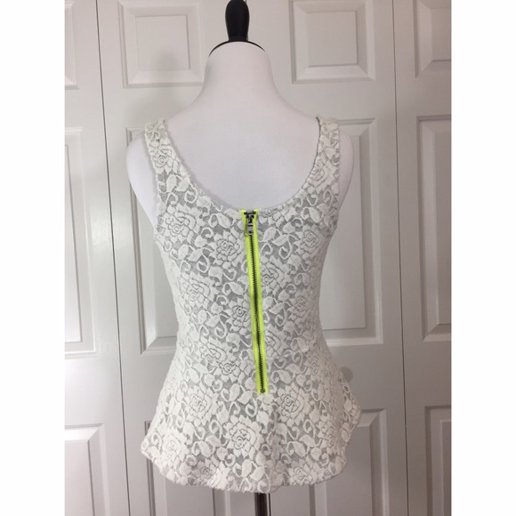 Embroidered/textured peplum tank