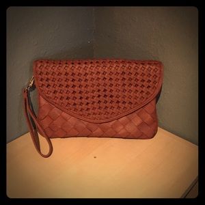 Brown leather clutch