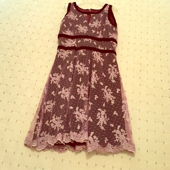 A custom made velvet dress with beaded lace