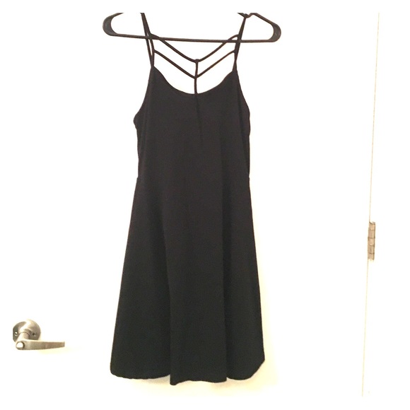 Short black dress with front strappy detail!