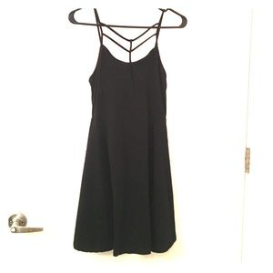 Short black dress with front strappy detail!