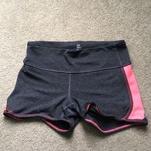 Pink and gray spandex workout shorts