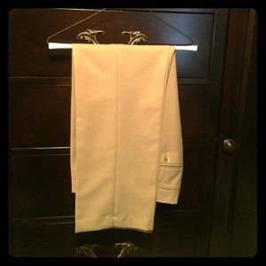 One tan pair of dress slacks