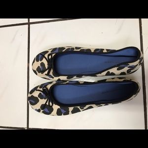 Cream color flats with blue cheetah prints
