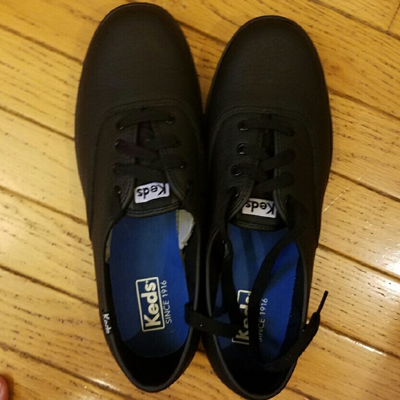 Black leather Keds