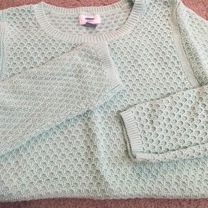 Seafoam green sweater.