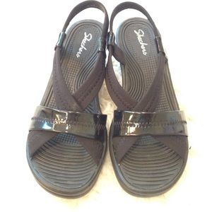 Skechers Rumblers Criss-Cross Sandals.