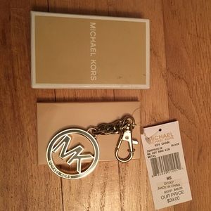 Gold and black Micheal Kors keychain