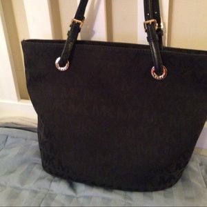 Black fabric MK handbag.