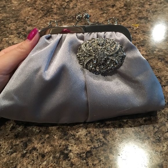 Silver bag with broach embellishment