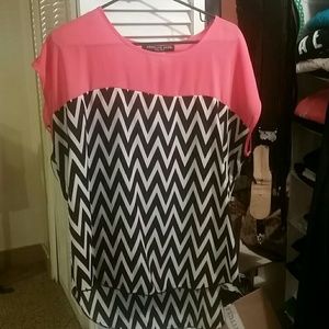 Coral and black and white cheveron striped blouse.