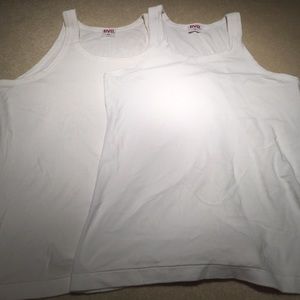 2 men white tank tops