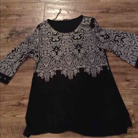 Ladies top by Calessa