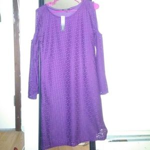 Never worn, still has tagPurple cut- out arm dress