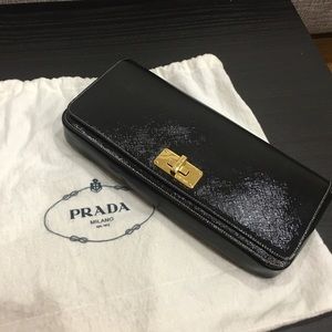 Prada patent clutch