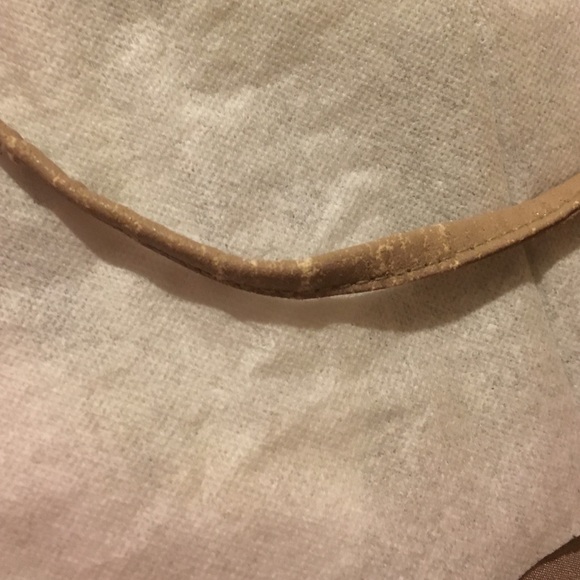 Please see condition of strap As Is
