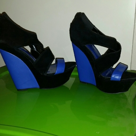 Blue and black pumps