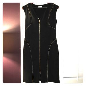 Clavin Klein size 6 black dress with gold zipper.