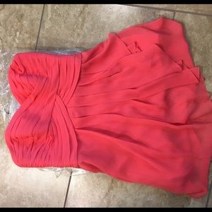 Davids bridal heart shaped coral dress.