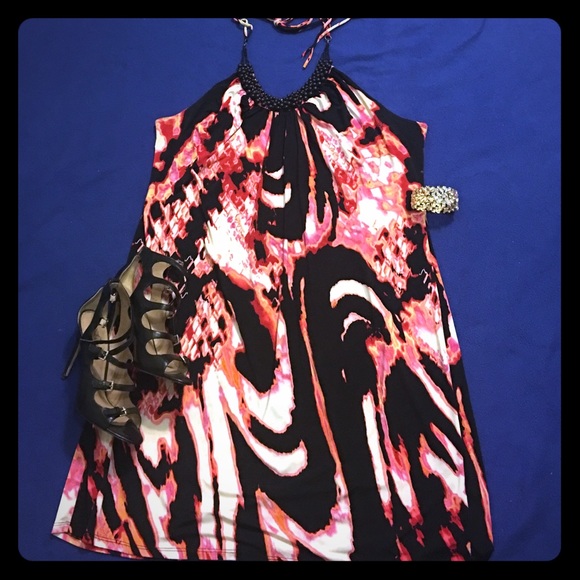 Halter dress with beaded neckline.