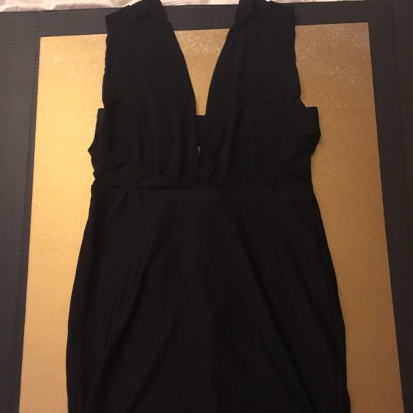 Black low cut Bebe dress. NWT - Picture 2 of 3
