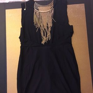 Black low cut Bebe dress. NWT