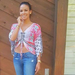 This colorful, once worn Bebe top!