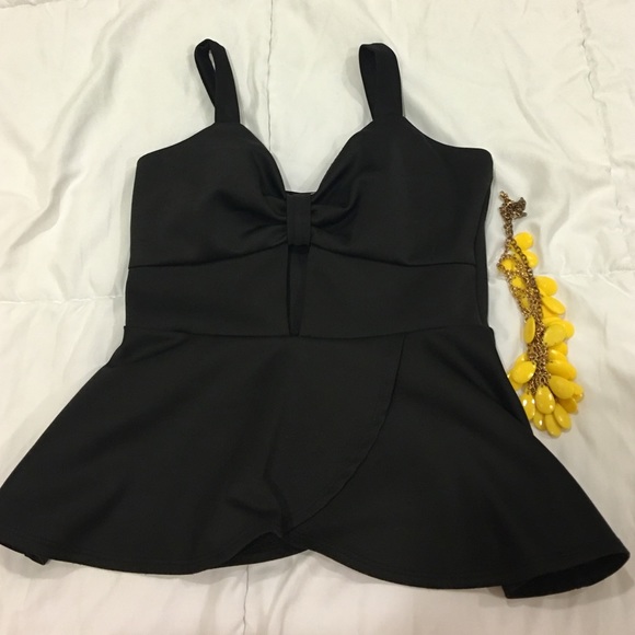 Black peplum top...
