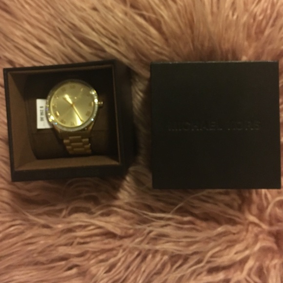 Michael Kors gold watch with diamond bezel