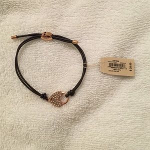 Adjustable leather bracelet with charm