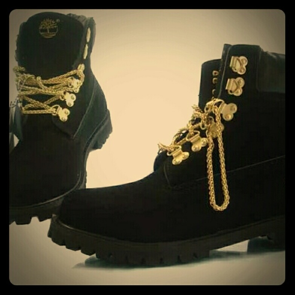 black timbs with gold