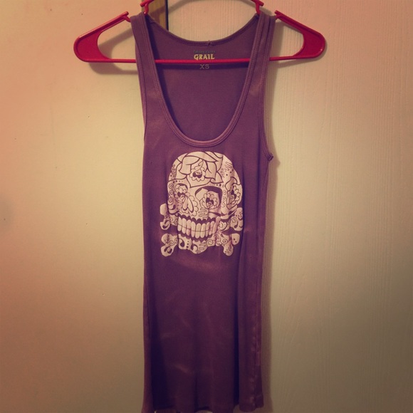 Skull muscle shirt with light fading.
