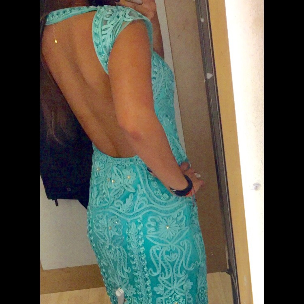 Evening gown or dress w/ open back and cap sleeves