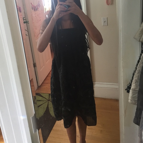 Black strapless fit and flare dress.