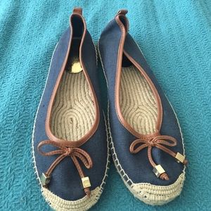 The shoes are Michael Coors