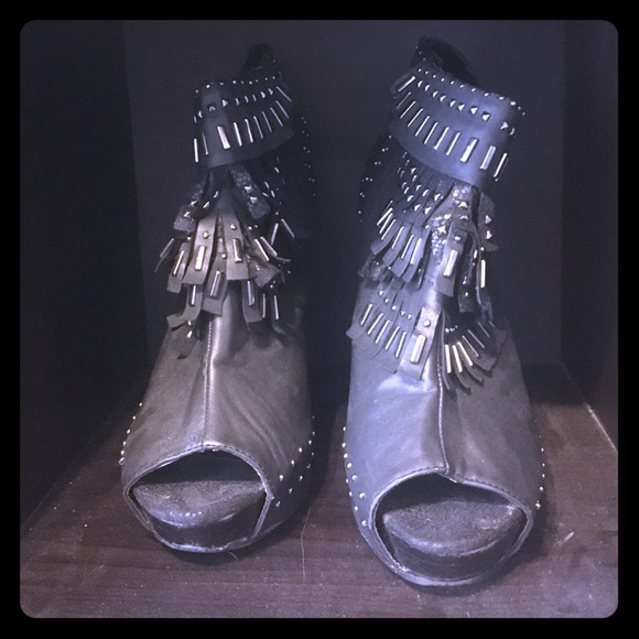 Fringe black heels.