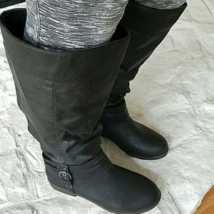 Black slouch boots.