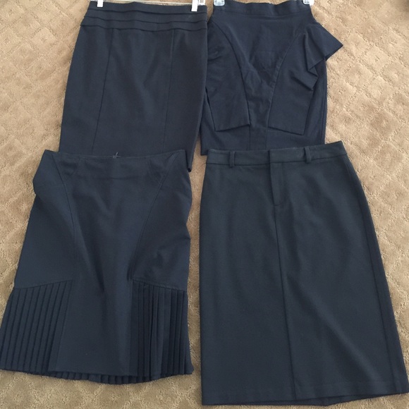 Multiple, variety black skirts