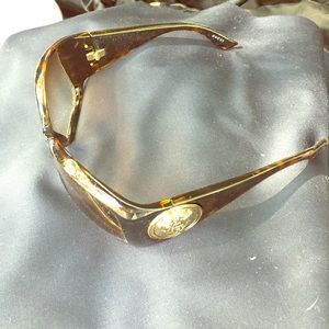 Gucci sunglasses with original case and soft wipe.