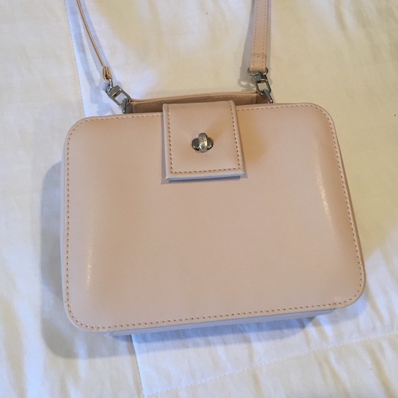 Nude luggage style handbag