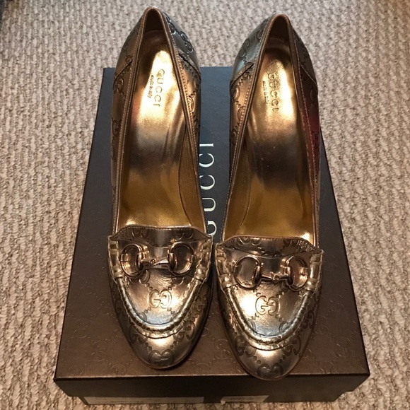 Gucci high heel loafer.