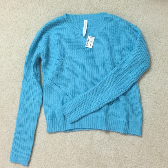 Blue sweater.