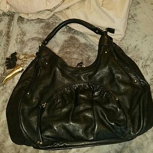 Black botkier handbag with charms. Authentic