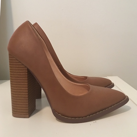 Lulu's brand new tan pumps