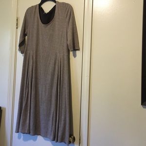 A-line dress. Taupe. 3/4 length sleeves.