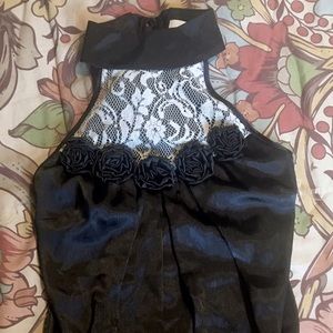 Black halter top with lace and roses.
