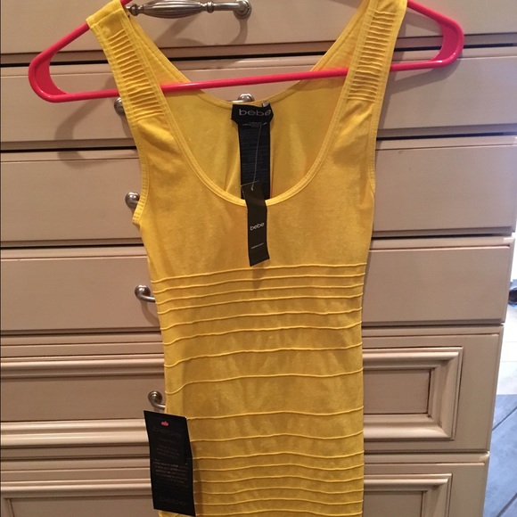New yellow Bebe dress