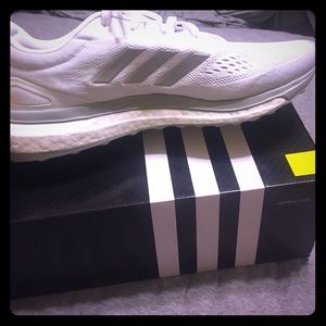 Women's Adidas Sonic Drive running shoes.