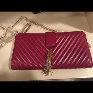 New dark red Bebe purse with gold chain